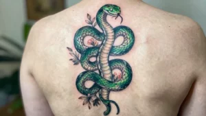 18 Elegant Spine Tattoos for Women: Snake Design Ideas